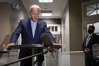caption: Democratic presidential nominee and former Vice President Joe Biden speaks to reporters about the passing of Supreme Court Justice Ruth Bader Ginsburg upon arrival at New Castle County Airport in Delaware.