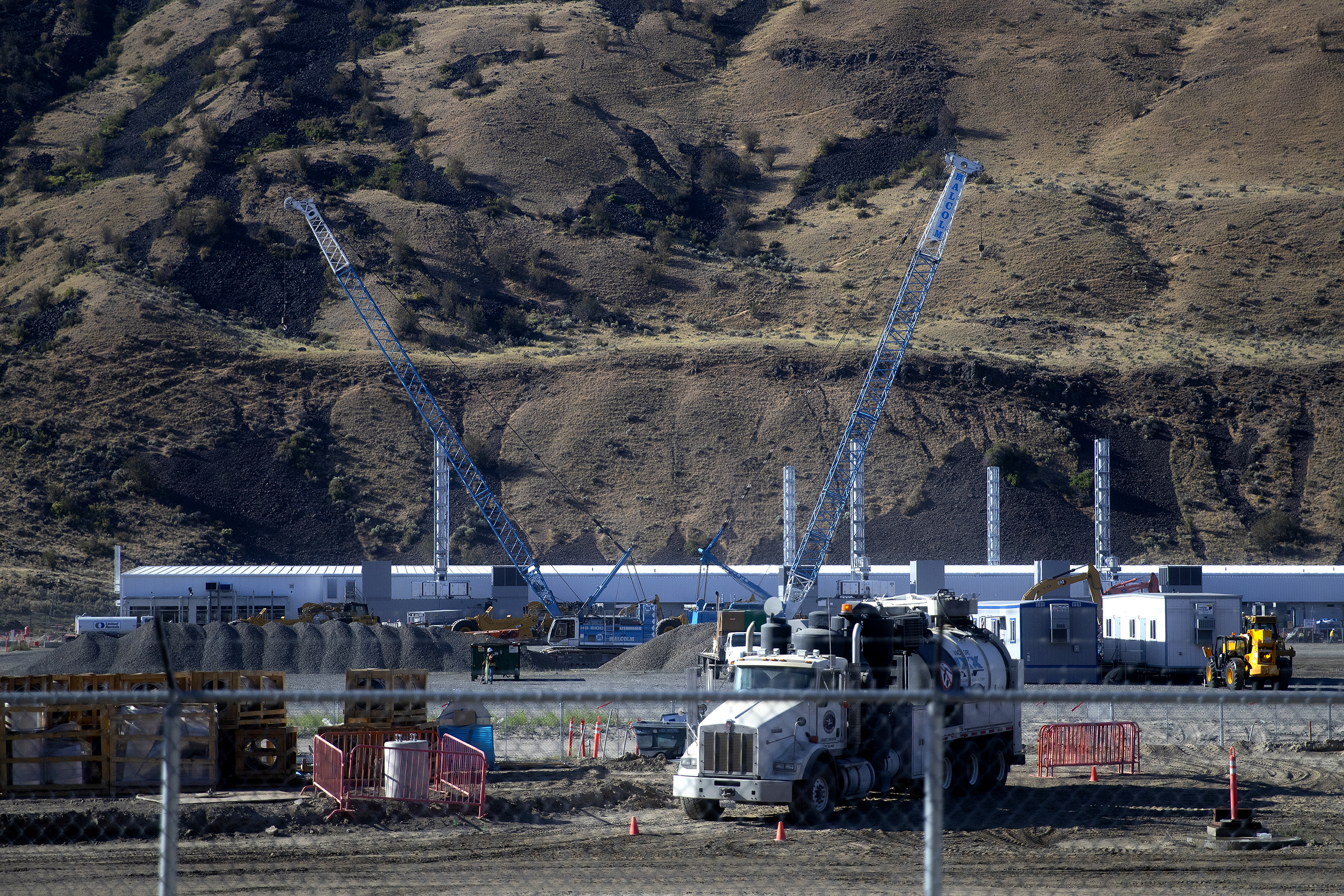 caption: Construction of a new Microsoft data center is shown on Friday, July 18, 2025, in Malaga, Washington. 