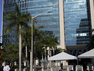caption: News media are set up outside of the Wilkie D. Ferguson Jr. U.S. Courthouse where a grand jury is meeting, June 7, 2023, in Miami.