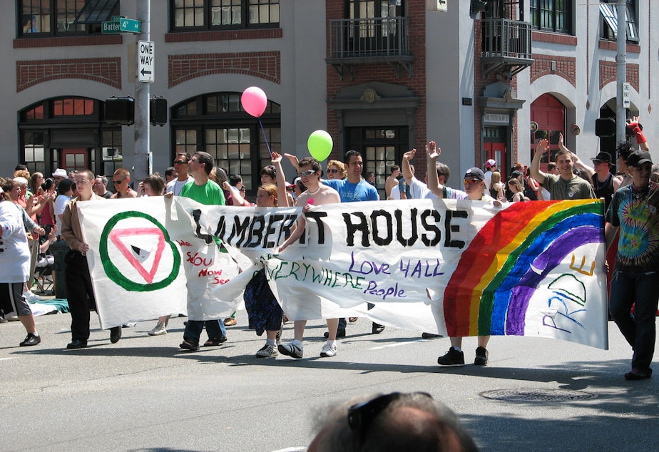 caption: Supports of Capitol Hill's Lambert House march in the 2008 Pride parade.