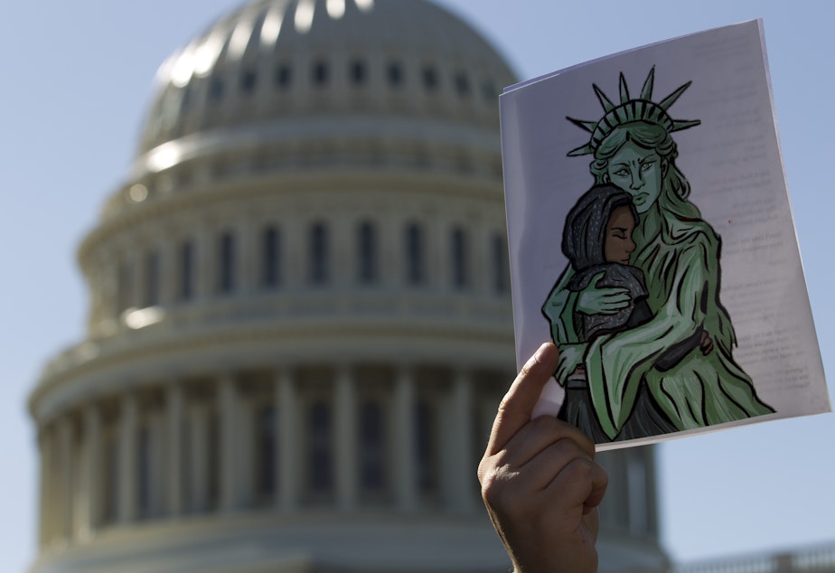 caption: Faith leaders and members of human rights groups protest outside of the U.S. Capitol calling Congress not to end refugee resettlement programs on Oct. 15, 2019, in Washington.