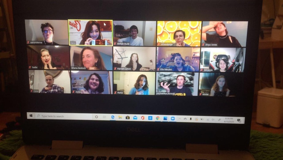 caption: The cast of Penguin Productions' new version of Shakespeare's "King Lear" rehearse via Zoom with director Shana Bestock, second row, second from left