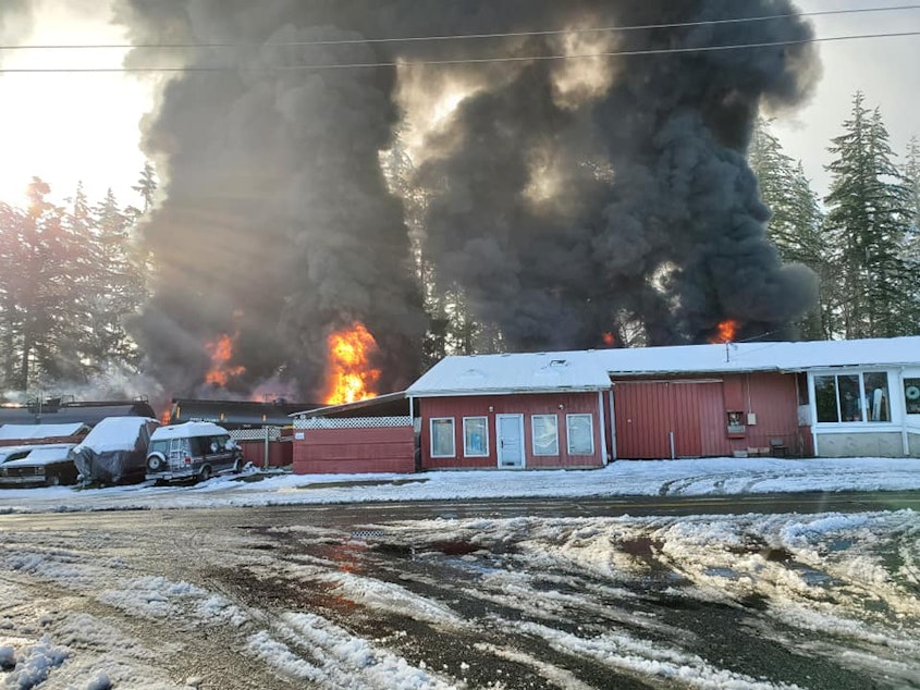 caption: A derailed oil train burns in the town of Custer, Washington, on Dec. 22.