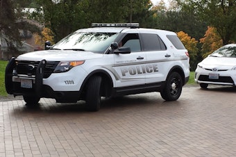 caption: A University of Washington police officer on campus.
