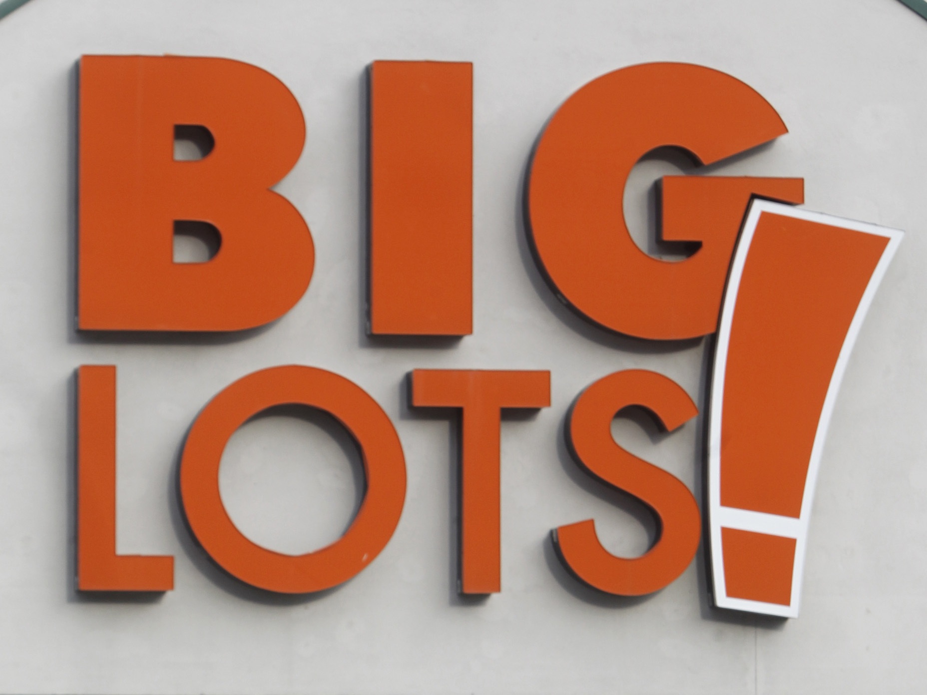 caption: A shopper leaves the Big Lots store on Dec. 4, 2012 in Berlin, Vt. 