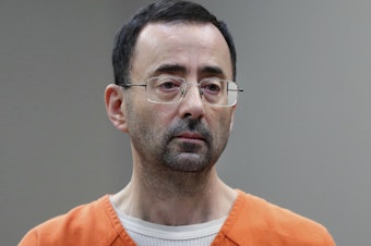 caption: Larry Nassar, the former USA Gymnastics doctor who admitted to sexually assaulting female athletes in his care, was reportedly stabbed multiple times by another inmate at a Federal prison in Florida Sunday.