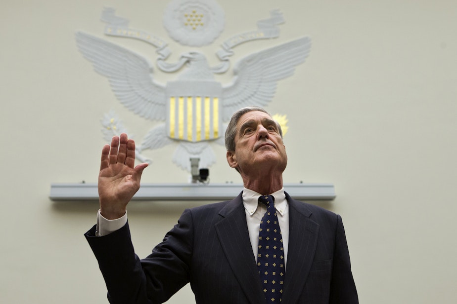 caption: FBI Director Robert Mueller is sworn in on on Capitol Hill in Washington, Thursday, June 13, 2013, prior to testifying before the House Judiciary Committee as it holds an oversight hearing on the FBI. (J. Scott Applewhite/AP)