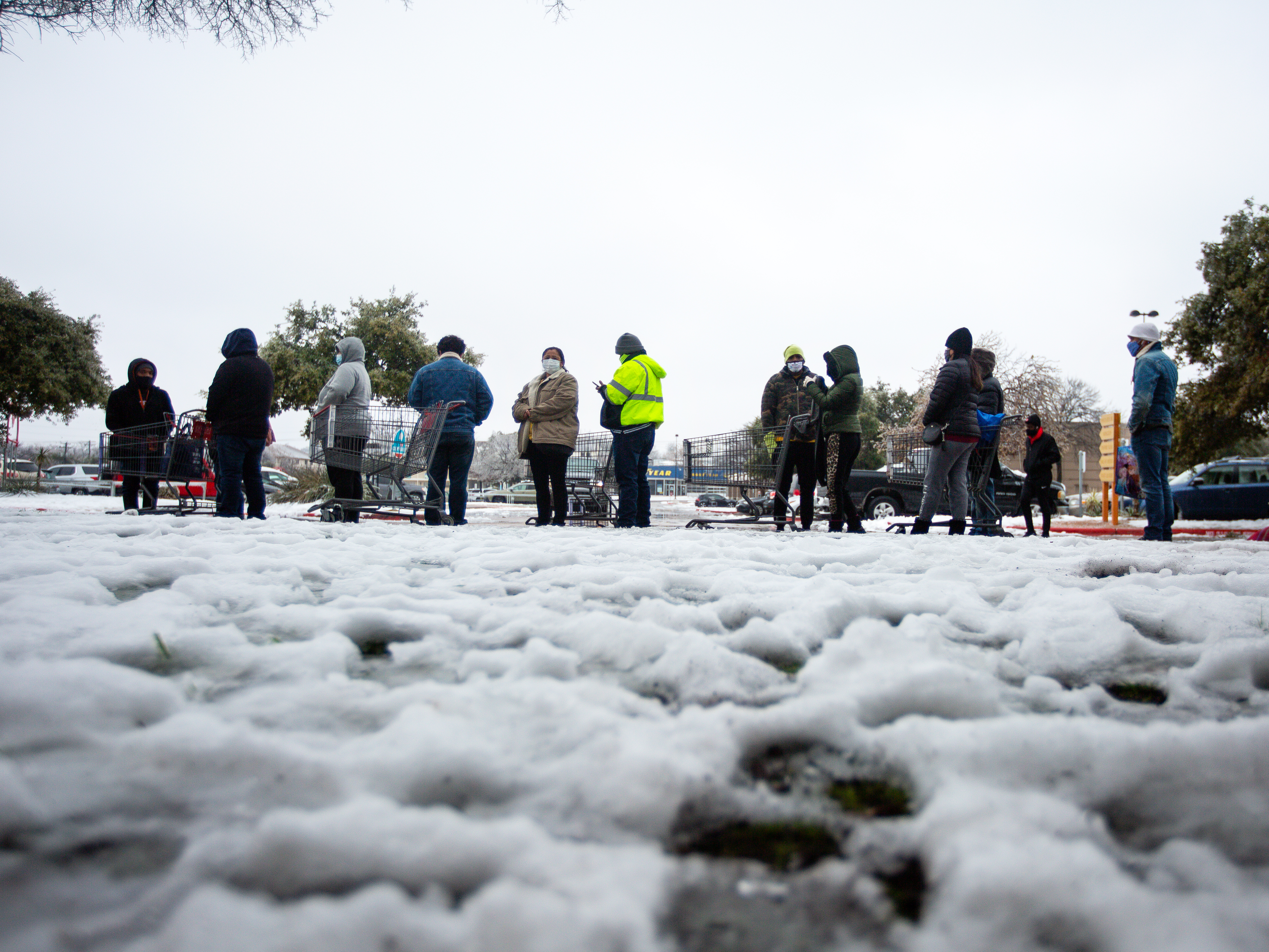 caption: People wait in long lines at an H-E-B grocery store in Austin, Texas, on Wednesday. The  weather disaster is an "absolutely awful nightmare," says Austin City Council member Natasha Harper-Madison.