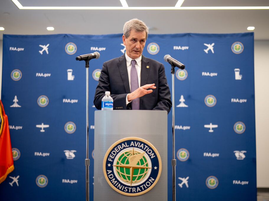 caption: Federal Aviation Administration administrator Mike Whitaker speaks at a news conference at FAA headquarters in May 2024. When Whitaker took over in 2023, the agency had not had a Senate-confirmed leader in more than 18 months.