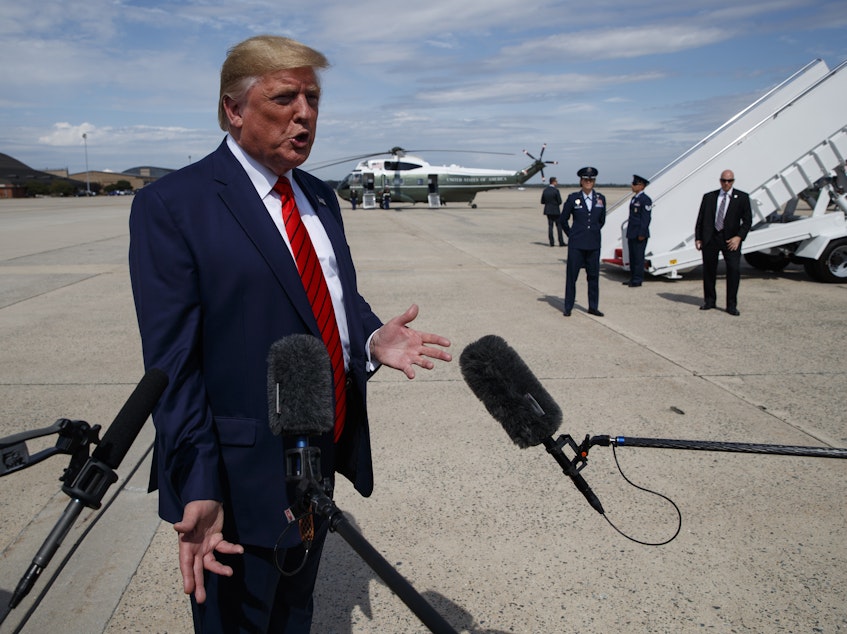 caption: President Trump on Thursday ordered that the number of refugees allowed to resettle in the U.S. in the coming year be cut to 18,000, down from the administration's previous refugee ceiling of 30,000.