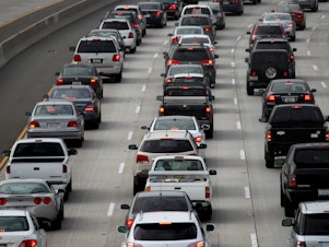 caption: Morning traffic fills the SR2 freeway in Los Angeles, California. The EPA released new rules for vehicle emissions that are expected to cut tailpipe pollution and greenhouse gas emissions, which are fueling climate change.