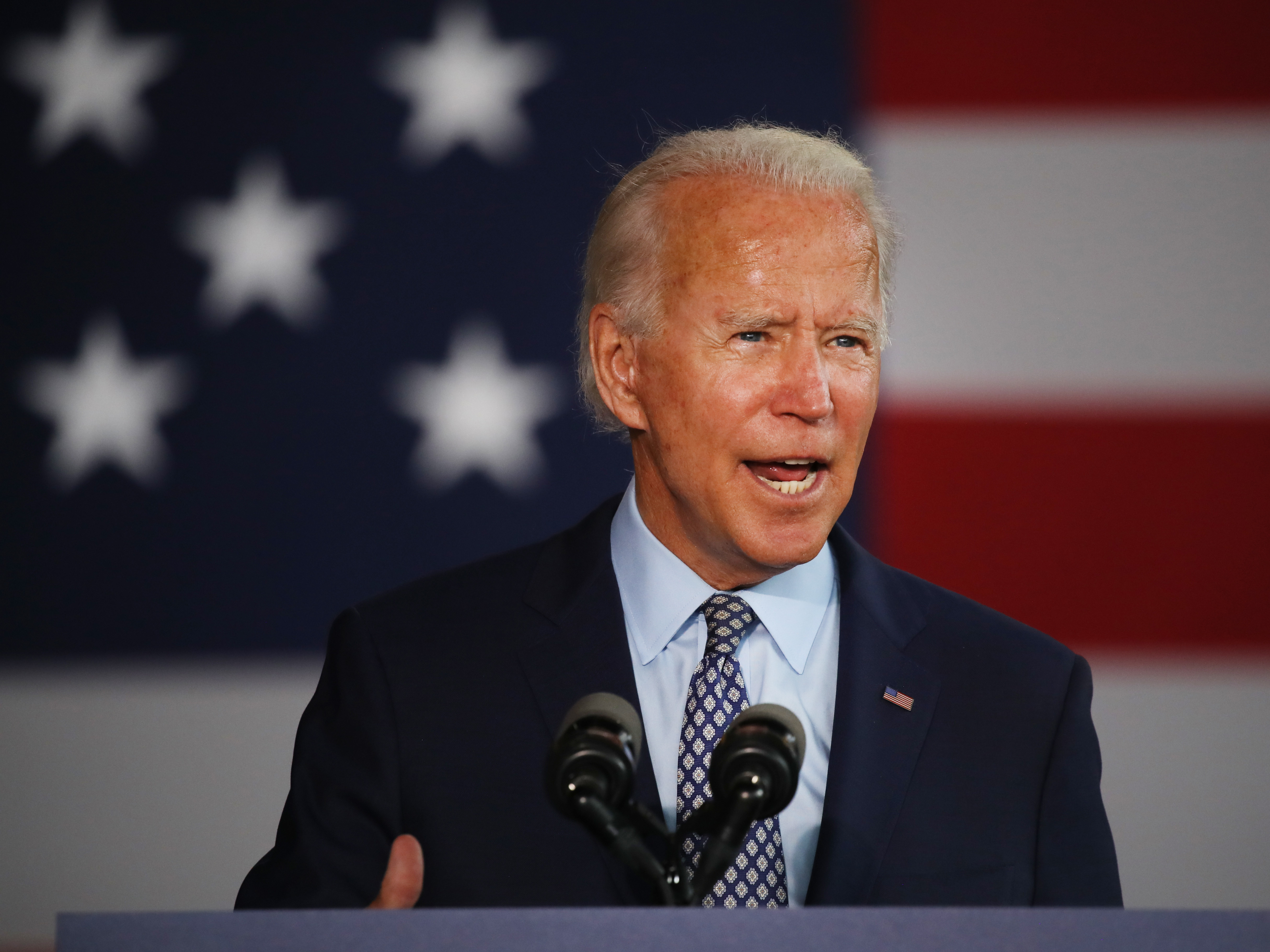 caption: Former Vice President Joe Biden, seen here during a July campaign event in Dunmore, Pa., told reporters that it would be up to the attorney general to decide whether to pursue criminal charges against President Trump once he leaves office.