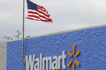 caption: On Tuesday, the Justice Department filed a civil suit accusing Walmart of failing to stop "hundreds of thousands" of improper opioid transactions at its chain of pharmacies.