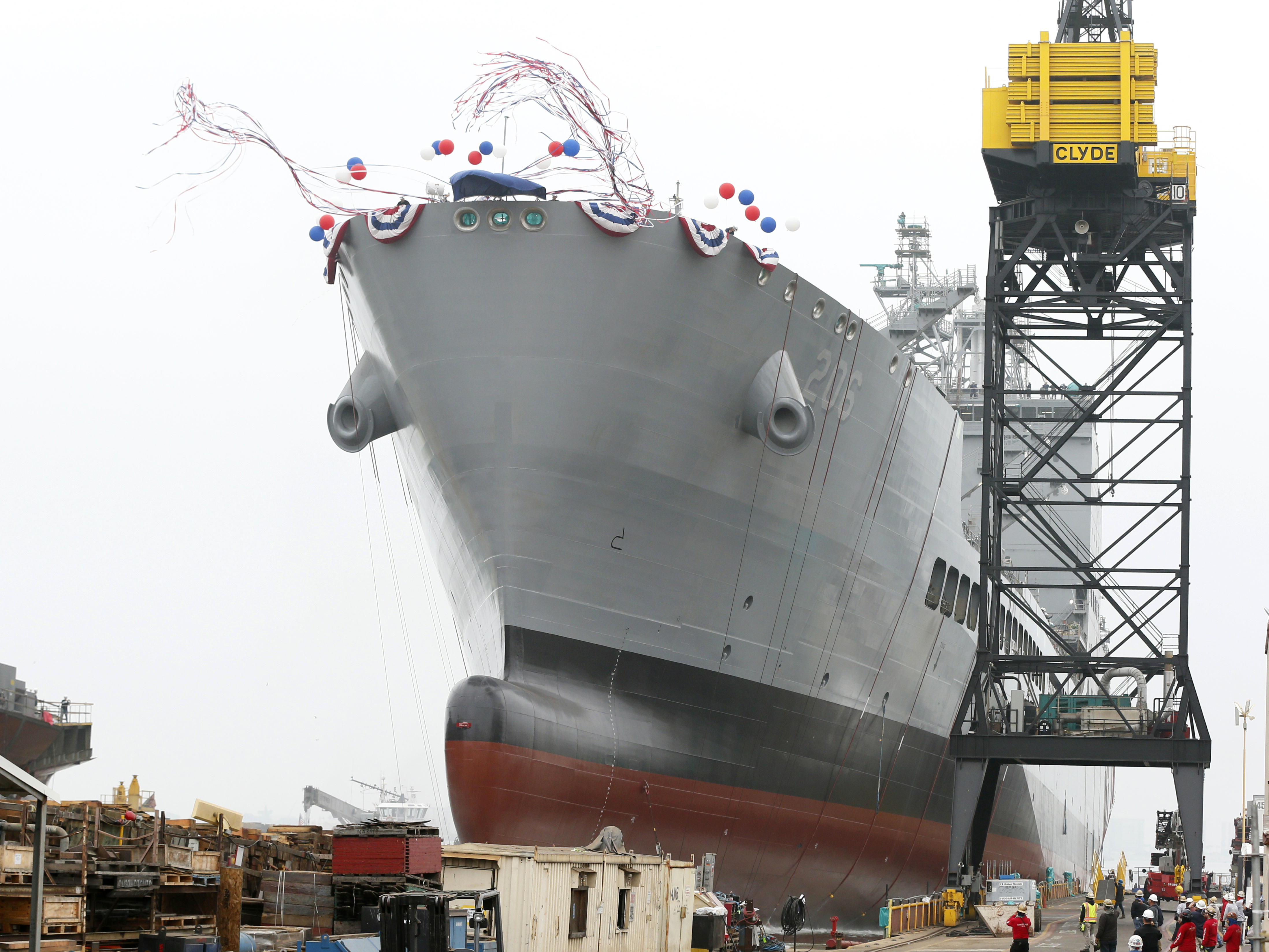 caption: The U.S. Navy launches the USNS Harvey Milk in San Diego, Saturday, Nov. 6, 2021.