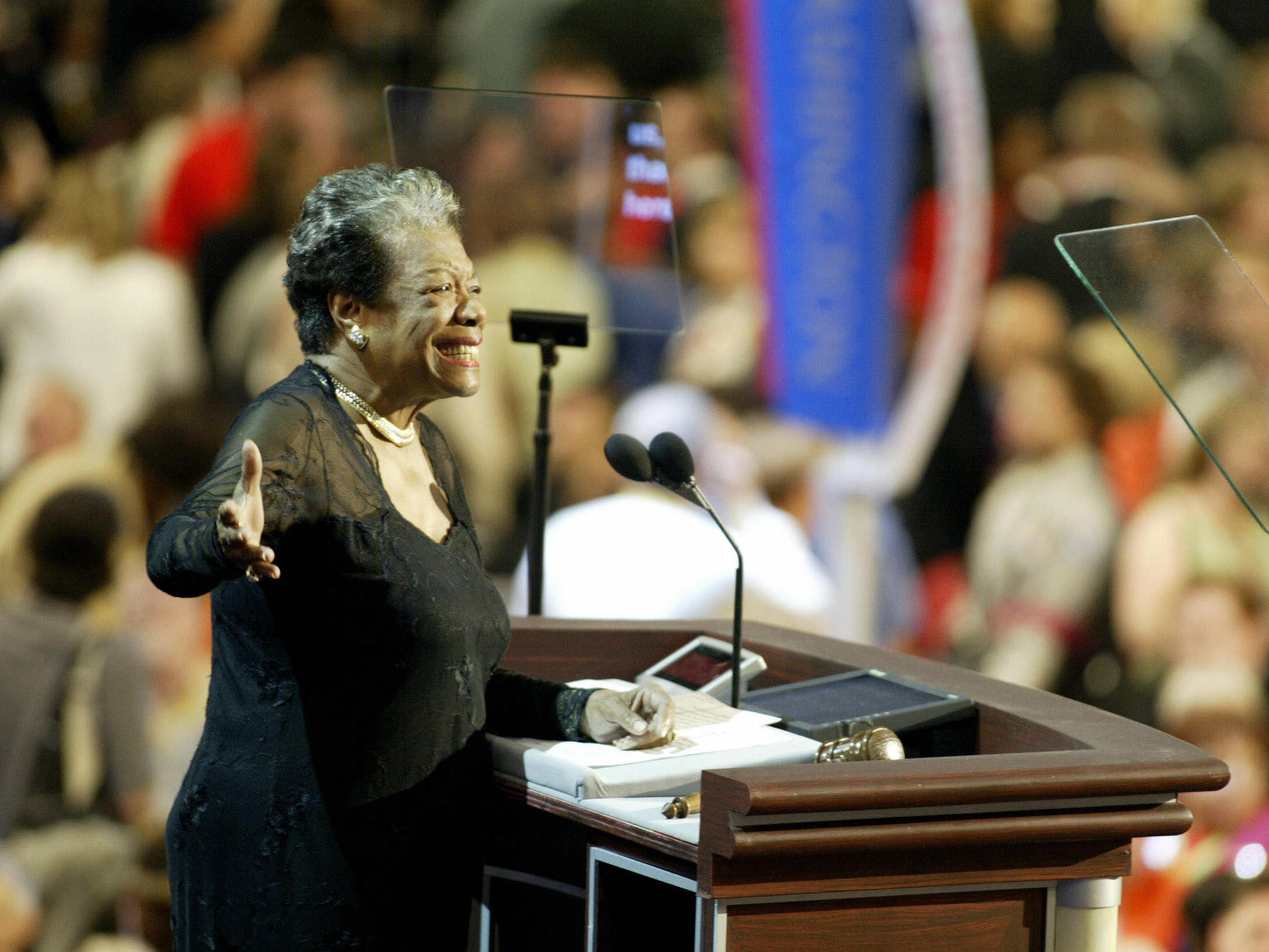 caption: Poet and activist Maya Angelou seen addressing the Democratic National in Boston, Massachusetts in July 2004. She is one of the female trailblazers who will be featured on some U.S. quarters starting in 2022.