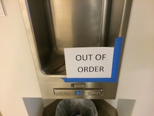 caption: A water fountain at the UW Medical Center is off limits after the discovery of the Legionnaires' disease bacteria in part of the hospital.