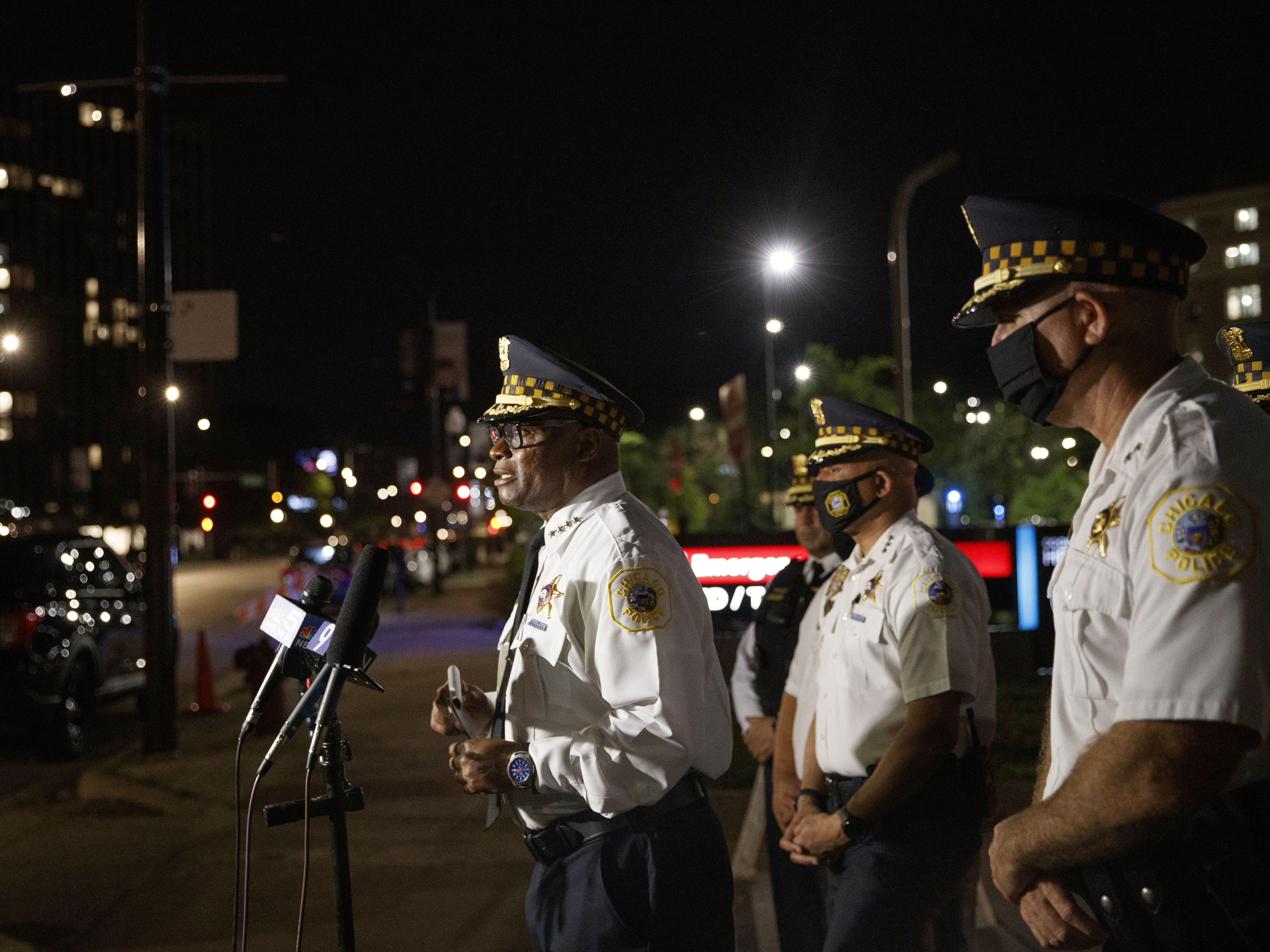 caption: Chicago police Superintendent David Brown talks with members of the press outside Stroger Hospital, where two officers were brought after being shot during the Fourth of July holiday weekend.