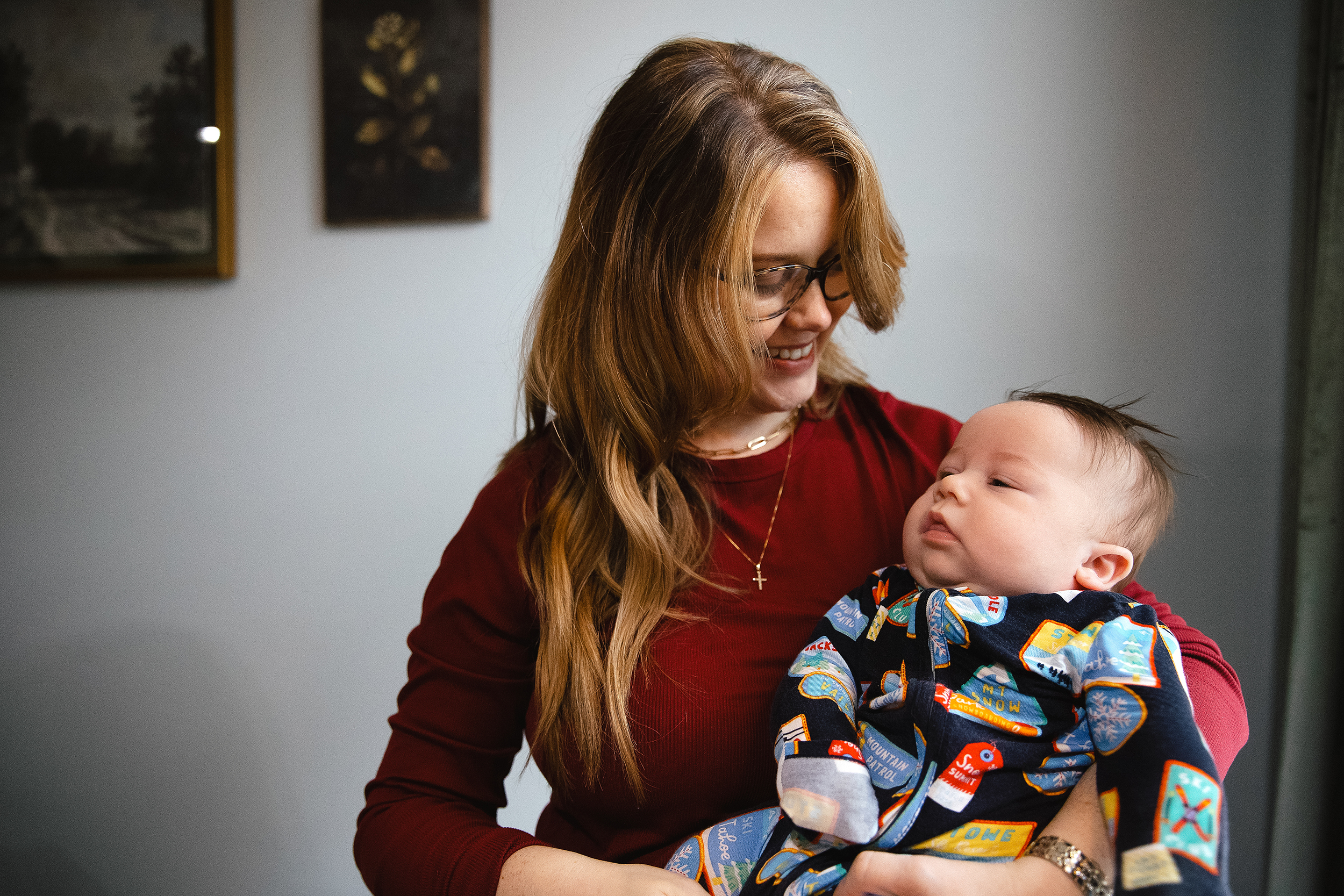 caption: Kelli Gehrke holds her 3-month-old son, Max, at her home on Thursday, October 23, 2025, in Lacey. 