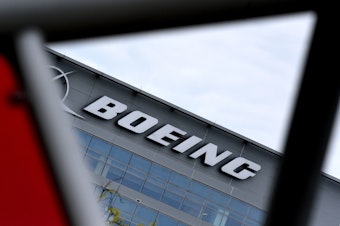caption: The Boeing headquarters is seen amid the coronavirus pandemic on April 29, in Arlington, Va. Boeing announced sweeping cost-cutting measures Wednesday after reporting a first-quarter loss of $641 million following the hit to the airline business from the coronavirus pandemic.