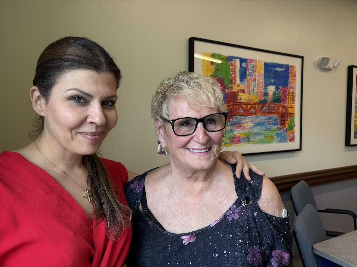 caption: Roberta Rabinovitz, right, had cancer and had been living with her grandson, sleeping on his couch. With her is Rachel Nassif, day center director at the PACE Organization of Rhode Island in East Providence.