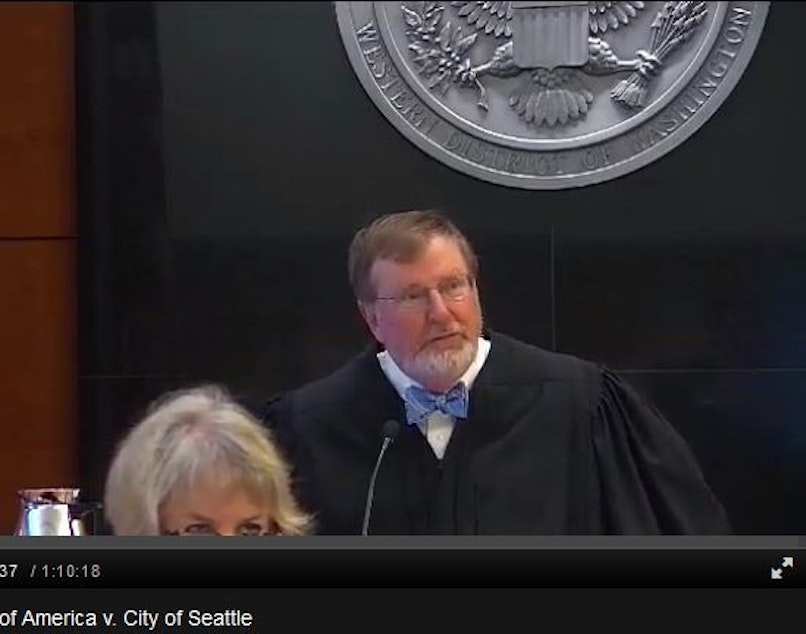 caption: Judge James Robart, of the U.S. District Court in Seattle, presides over his courtroom. Seattle's federal courthouse was part of a pilot to videotape the court. 