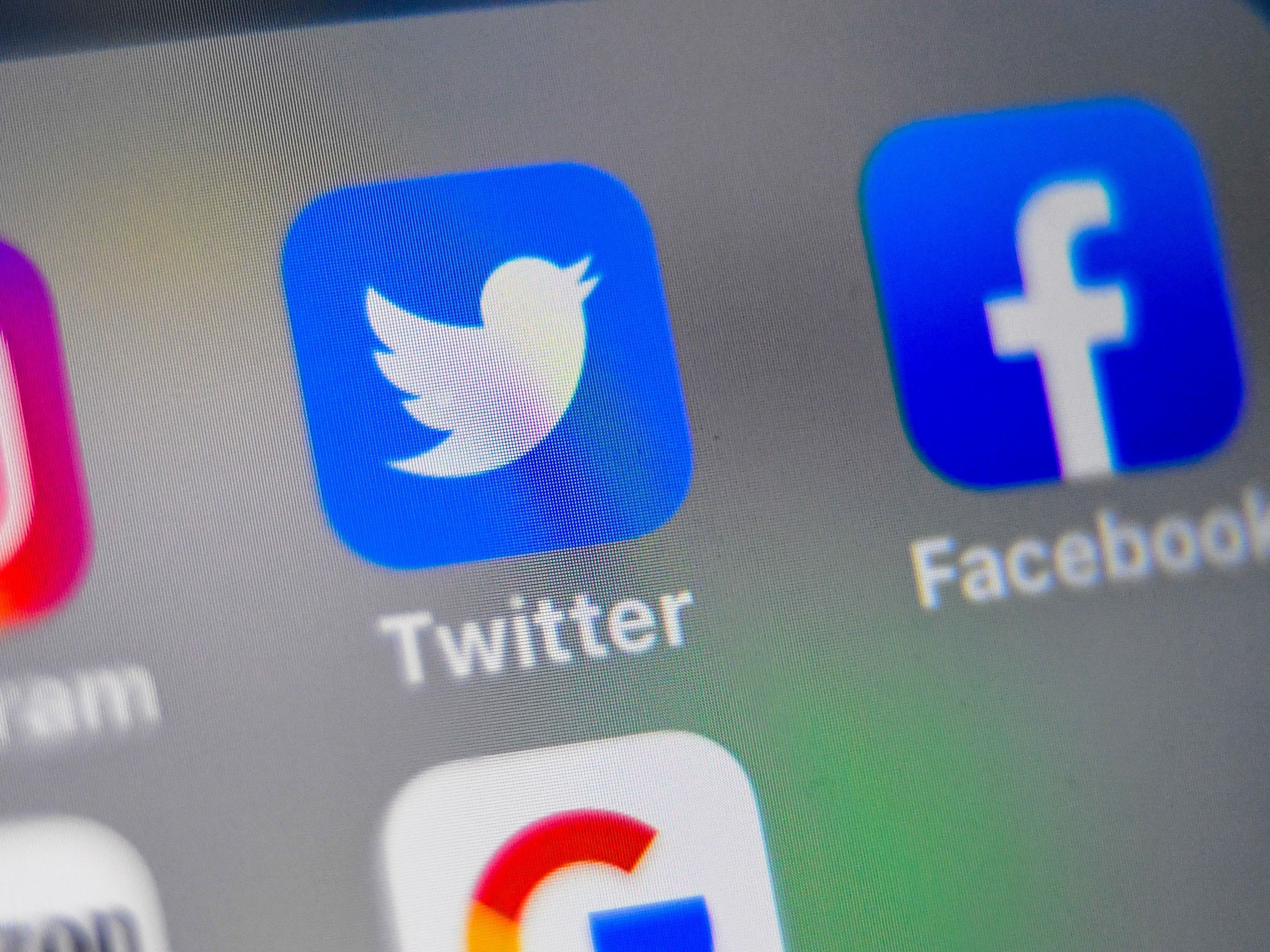 caption: Twitter and Facebook said their decisions to limit sharing of a New York Post article were meant to slow the spread of potentially false information.
