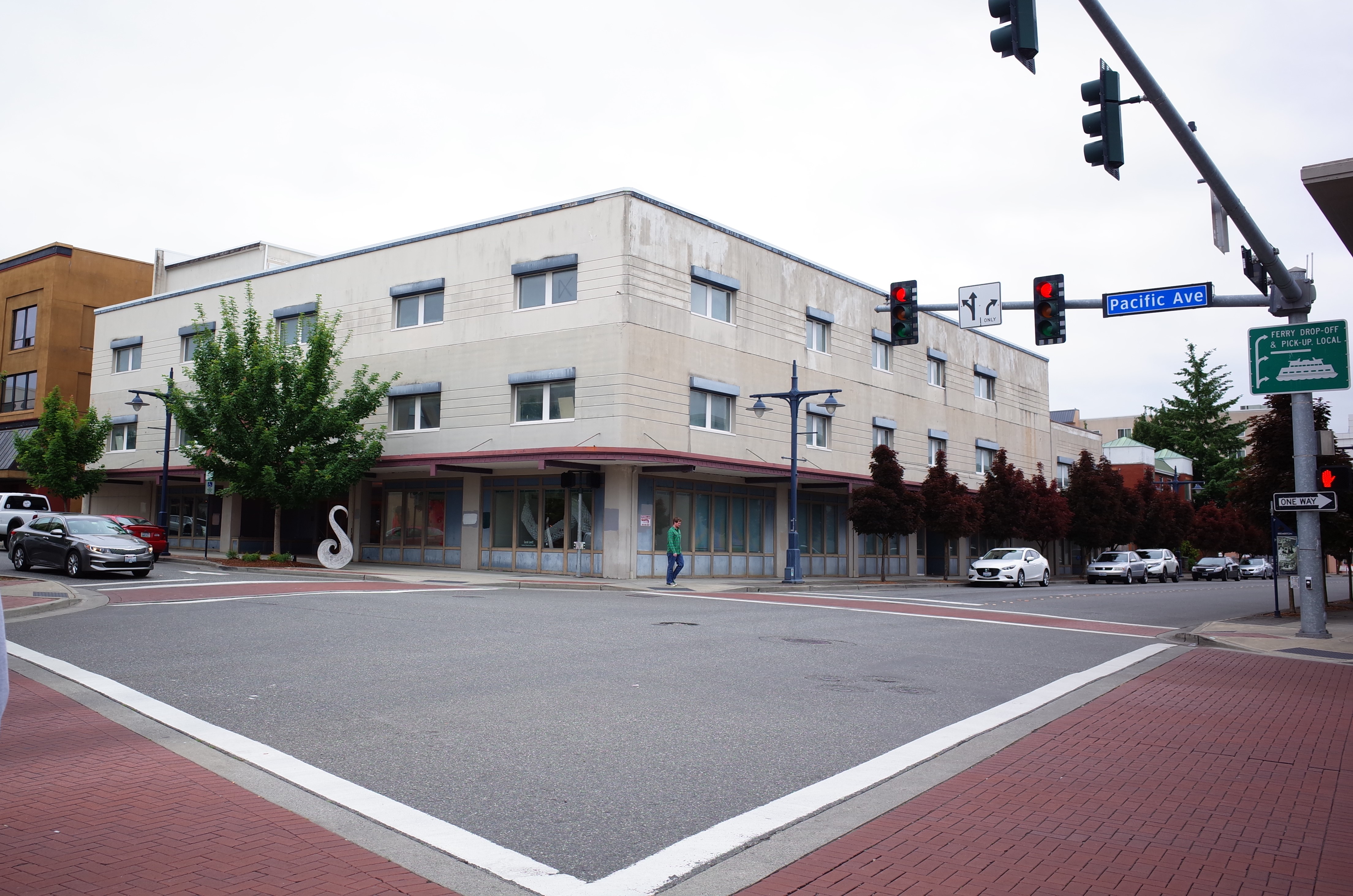 caption: Streets in Bremerton's downtown are frequently quiet. This photo was taken around 11:00 on a Monday morning, in front of the old Bremer department store.