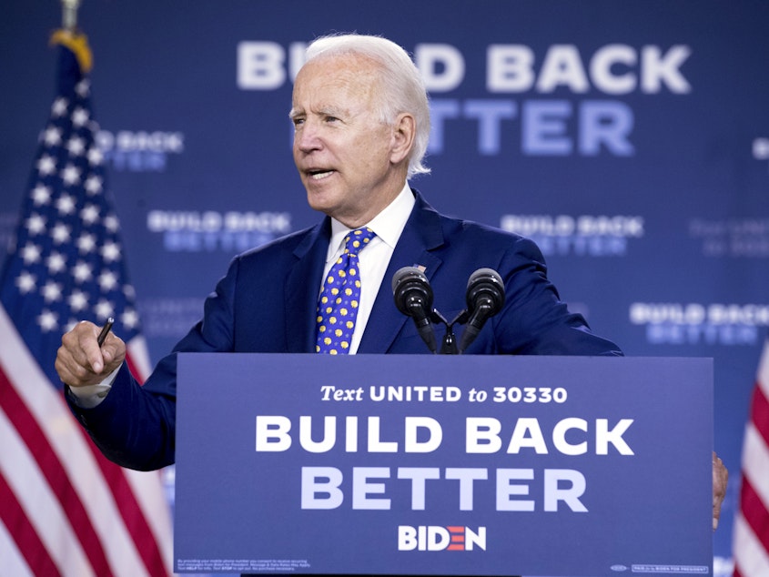 caption: Democratic presidential candidate and former Vice President Joe Biden speaks at a campaign event in Wilmington, Del., on Tuesday.