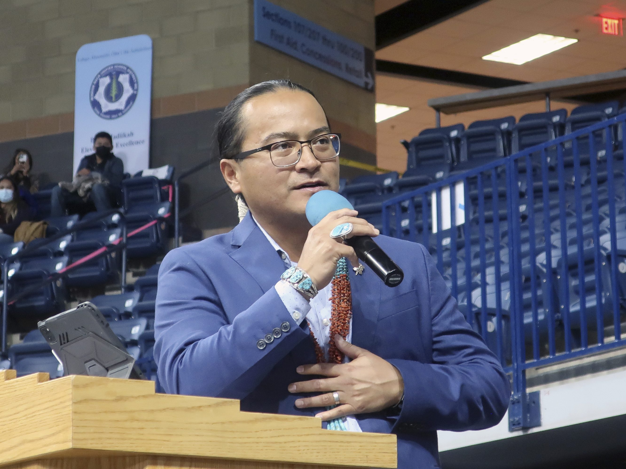 caption: Navajo Nation President Buu Nygren addresses the crowd at the inauguration on Tuesday, Jan. 10, 2023. Nygren was sworn in as president and is the youngest person to serve in that position. His vice president, Richelle Montoya, is the first woman in that job.