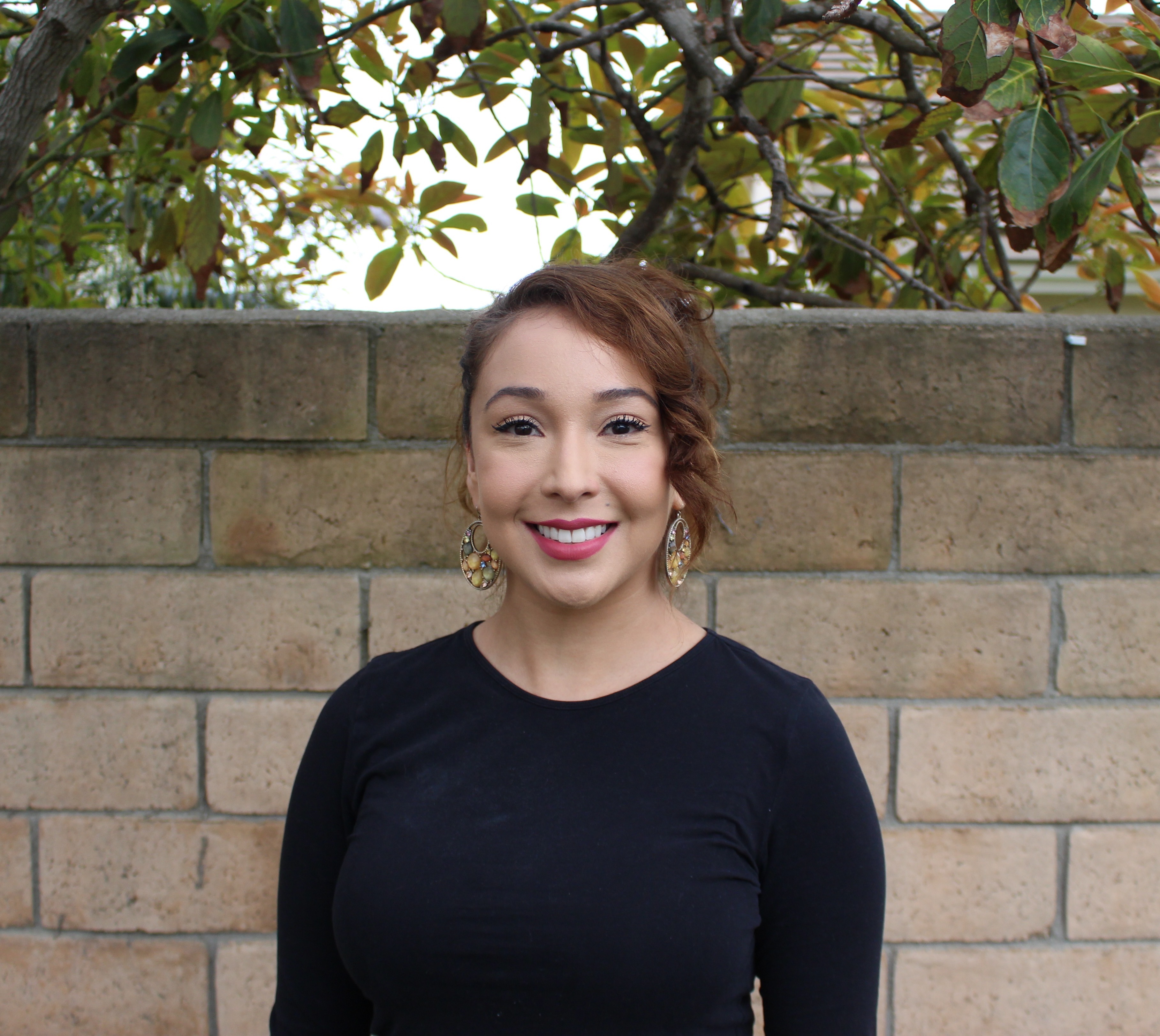 caption: Vanessa Delgado, of Irvine, Calif., recently got her COVID-19 vaccine. She also helped her farmworker father of Benton County, Wash., get his shot.