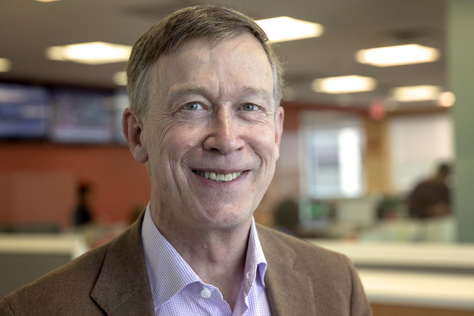 caption: 2020 presidential candidate and former Colorado Gov. John Hickenlooper, at WBUR. (Robin Lubbock/WBUR)