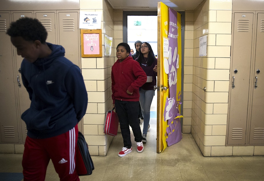 caption: Seventh-grade students leave Janet Bautista's science class as the bell rings on Thursday, March 28, 2019, at Asa Mercer Middle School in Seattle. 