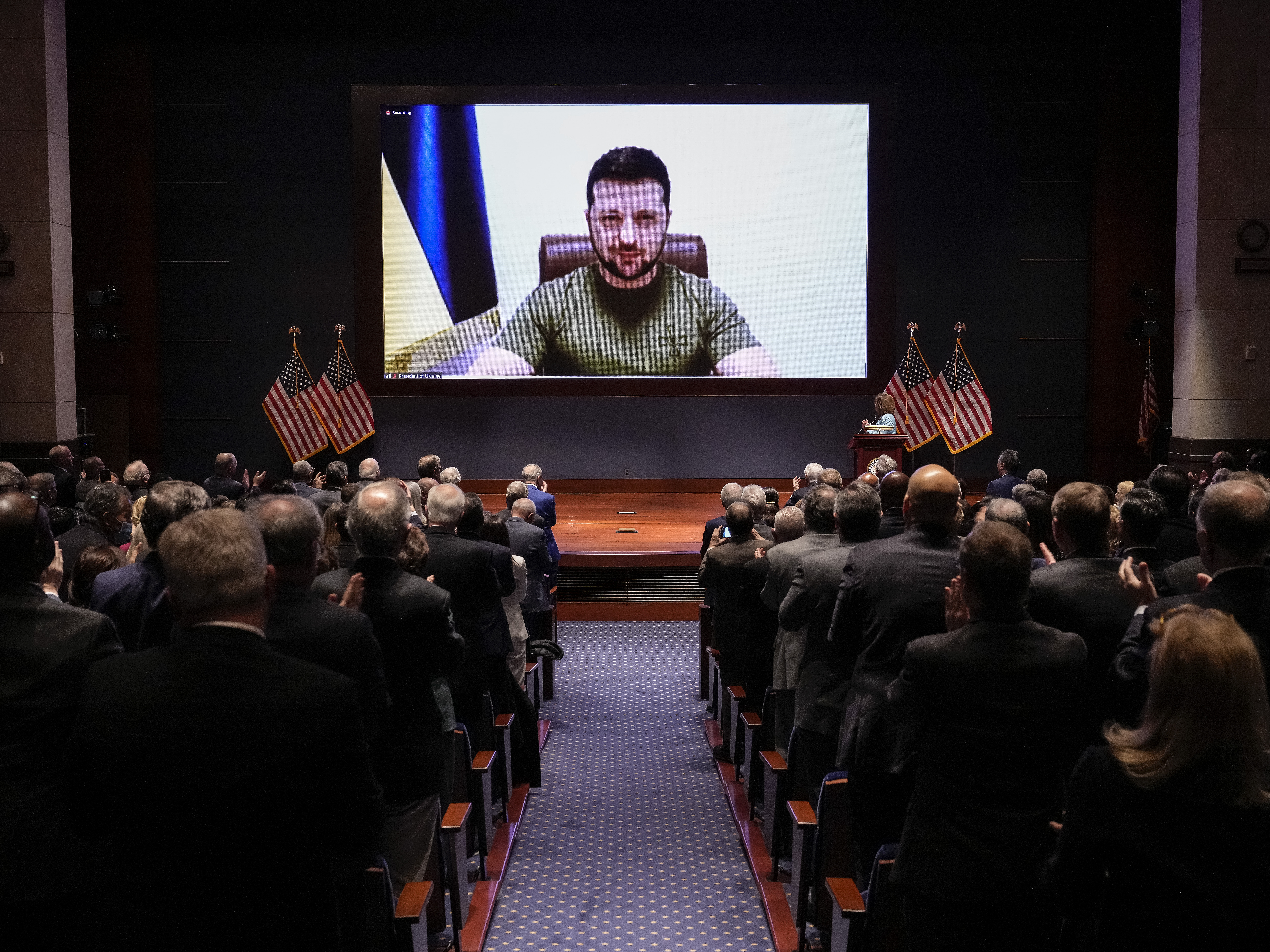 caption: Ukrainian President Volodymyr Zelenskyy delivers a virtual address to Congress at the U.S. Capitol on March 16, 2022, less than a month after Russia's invasion of Ukraine.