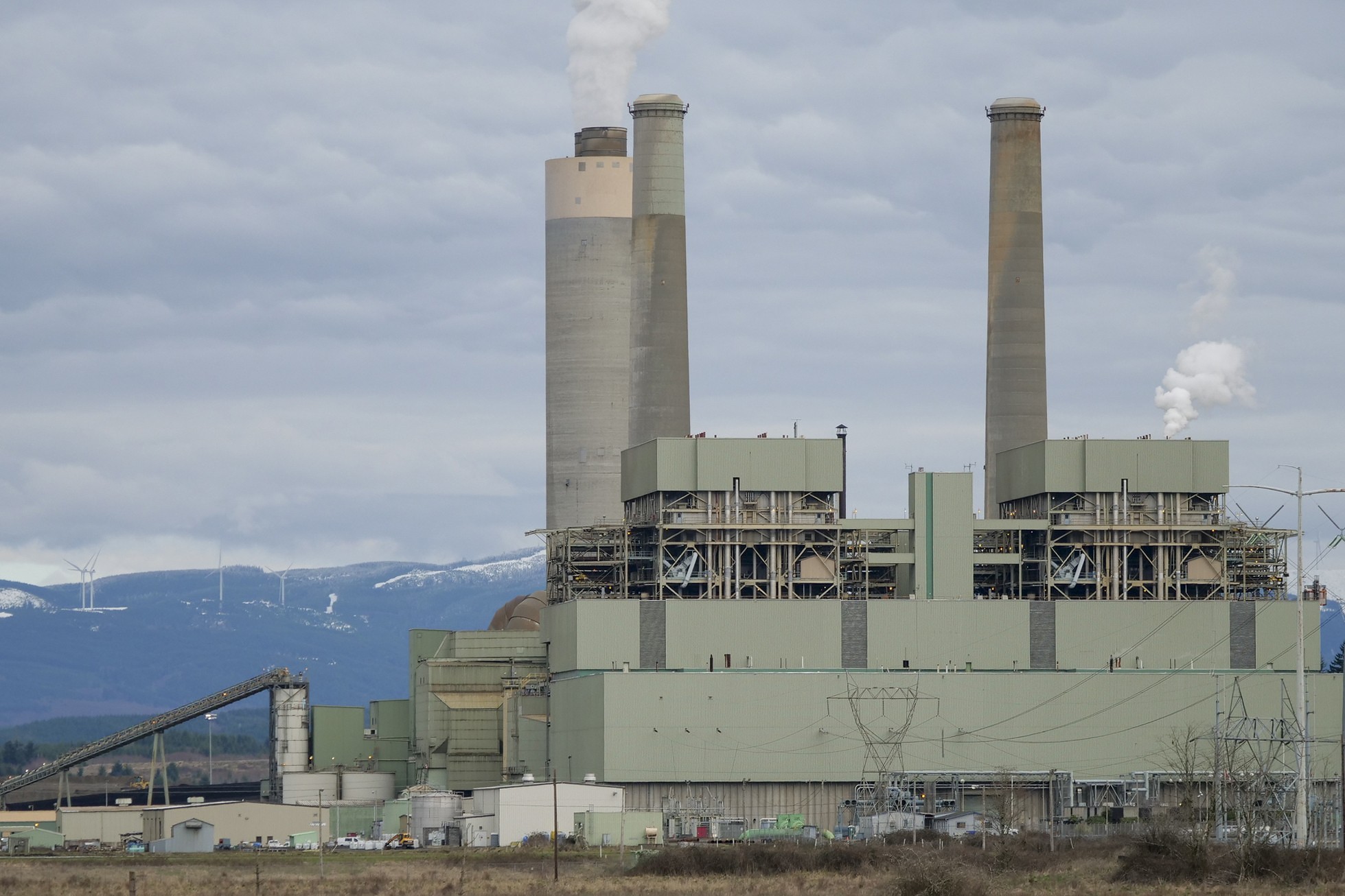 caption: TransAlta's Centralia power plant emits steam and carbon dioxide on March 6, 2024.