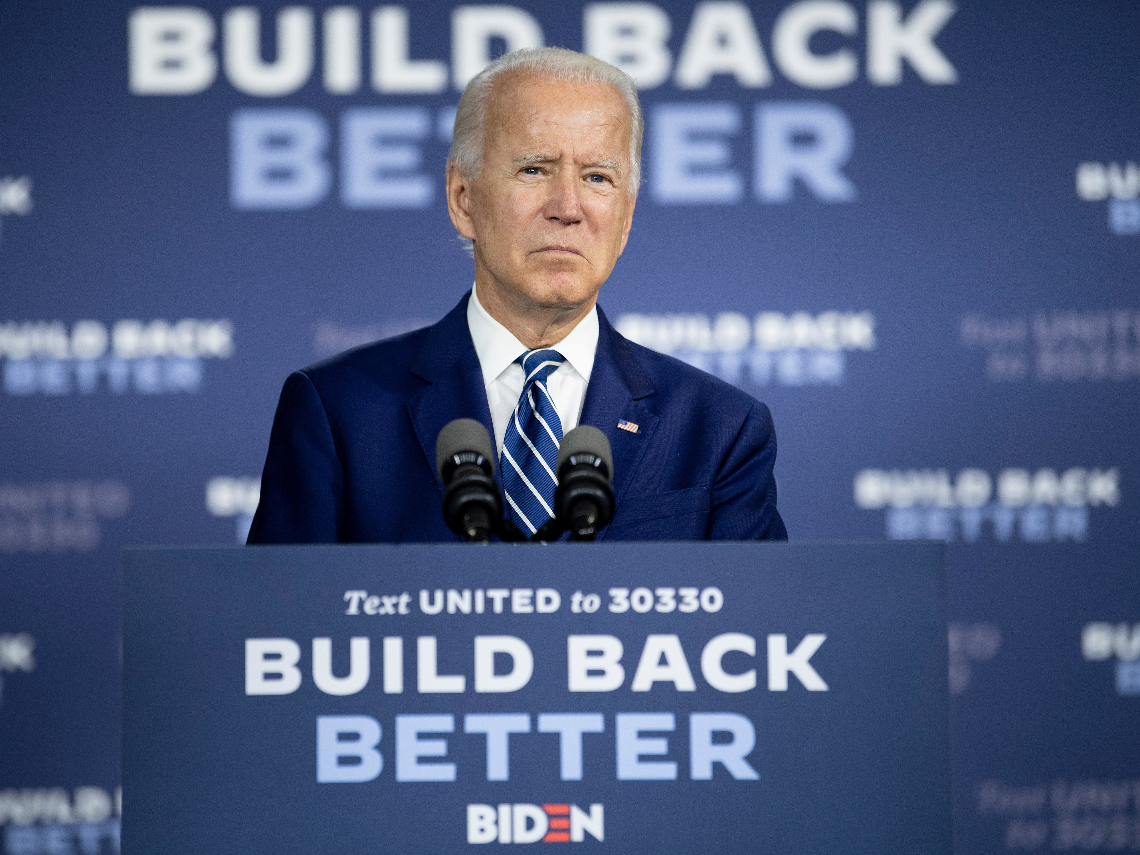 caption: Presumptive Democratic presidential nominee Joe Biden, seen here on July 21, unveiled the fourth plank of his "Build Back Better" agenda on Tuesday, to address racial inequities.