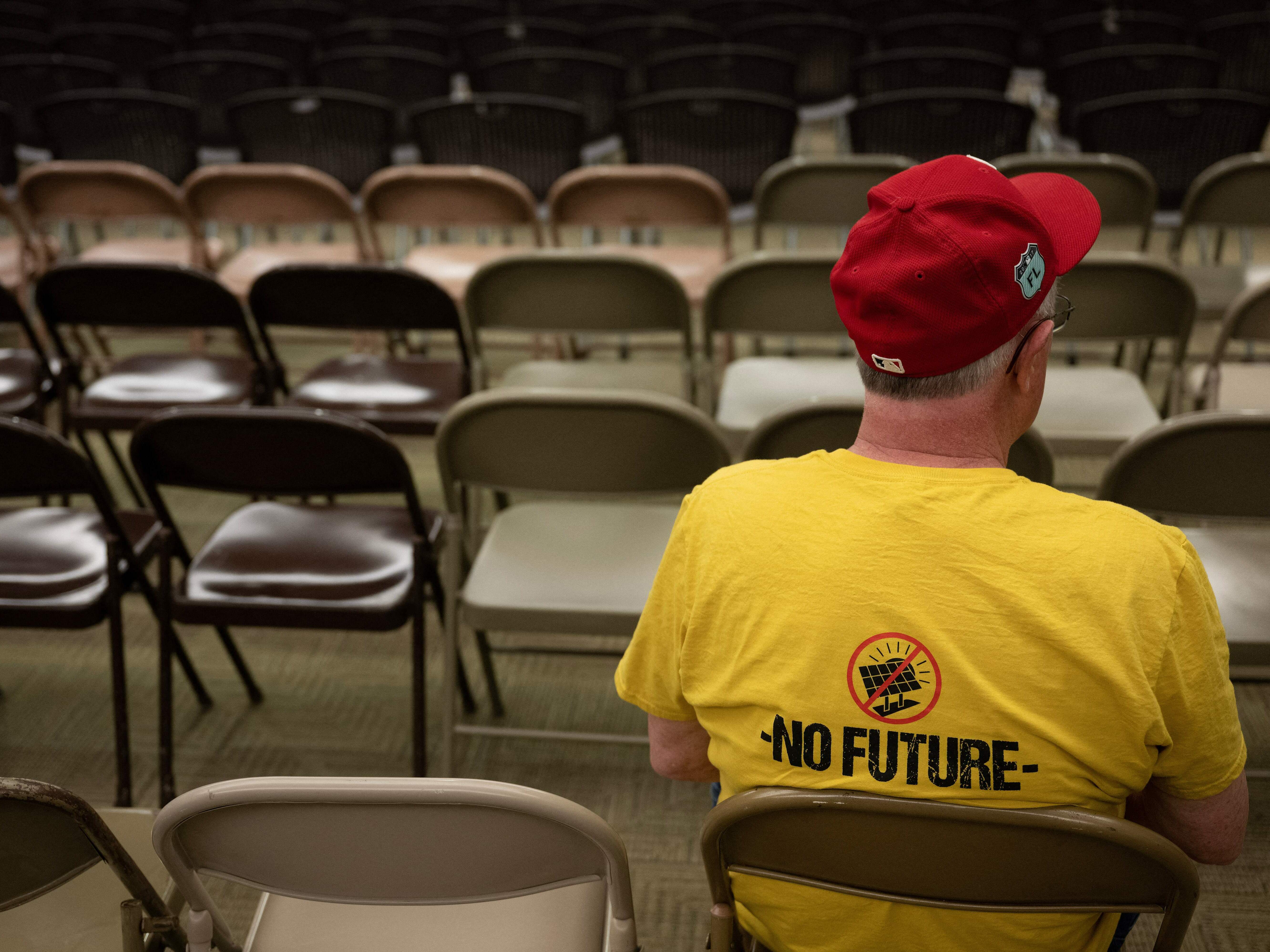 caption: Across the U.S., some opposition to larger solar projects comes from people who deny climate science. But some people opposing solar projects believe in climate change and are opposing solar on environmental and conservation grounds.