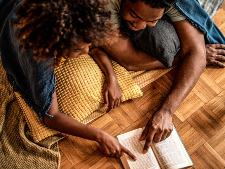 Keisha Siriboe, an early childhood literacy consultant with a PhD in early childhood education, says reading aloud can help people with stress management, hope and resilience.