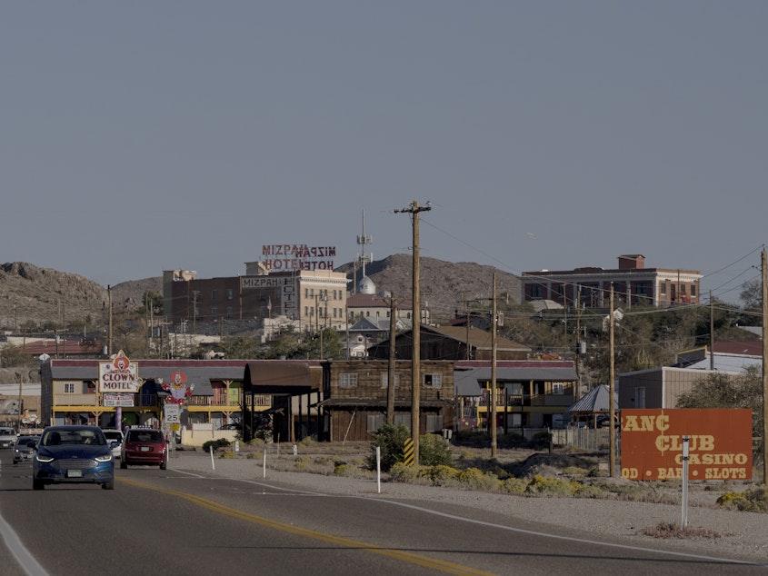 caption: Traffic passes through Tonopah, Nev. on Oct. 6, 2022.