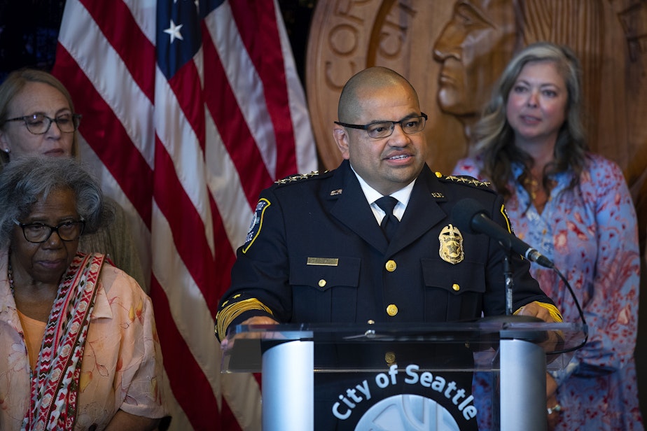 caption: Adrian Diaz answers questions during a press conference where he was announced by Seattle mayor Bruce Harrell as the new permanent Seattle Police Chief on Tuesday, September 20, 2022, at Seattle City Hall.