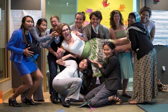 caption: RadioActive Summer 2014 youth producers and mentors, all dressed up and ready to make radio! 