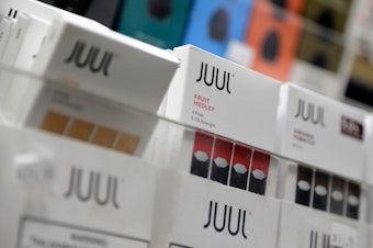 caption: Juul announced it will suspend sales of all non-tobacco, non menthol-based flavors of its e-cigarette products.