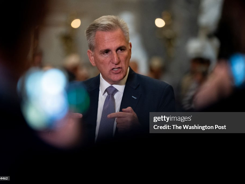 caption: House Speaker Kevin McCarthy addresses reporters in the Capitol late Tuesday evening after the Senate unveiled a bipartisan bill to avoid a government shutdown.