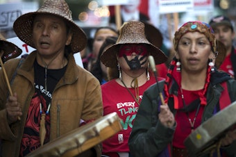 caption: Missing and Murdered Indigenous Women group members including Earth-Feather Sovereign, right, lead the march during the 'Cancel Kavanaugh - We Believe Survivors' march and rally on Thursday, October 4, 2018, in Seattle
