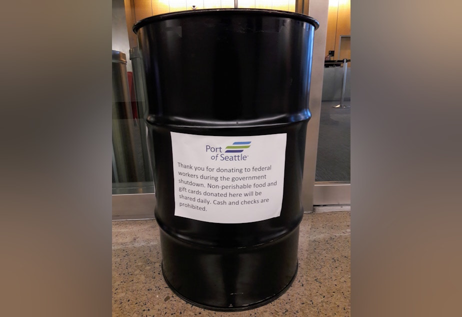 caption: The Port of Seattle setup this barrel last week after passengers asked how they could help federal employees working without pay during the government shutdown.