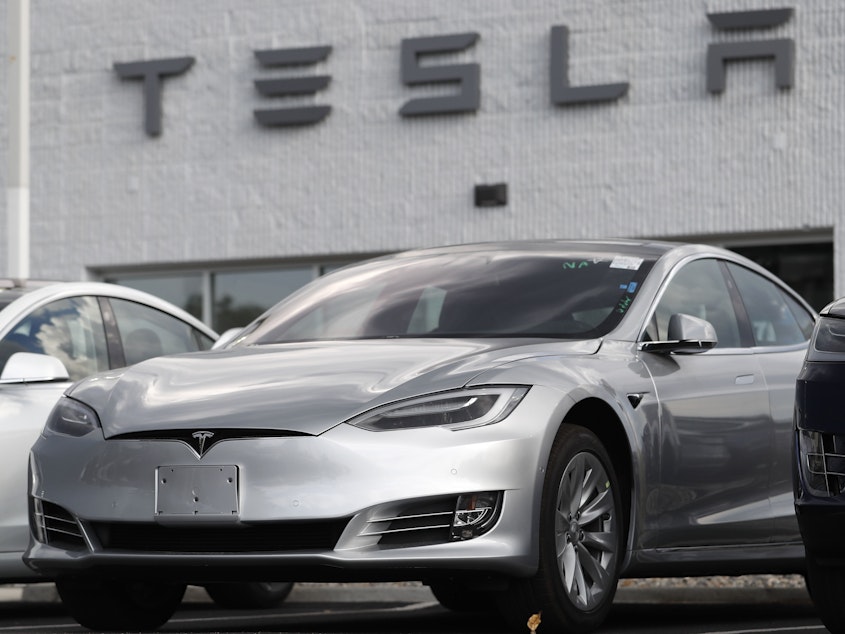 caption: Tesla reported 475,318 vehicles — 356,309 Model 3 and 119,009 Model S — are subject to the recalls, according to documents filed with the National Highway Traffic Safety Administration.