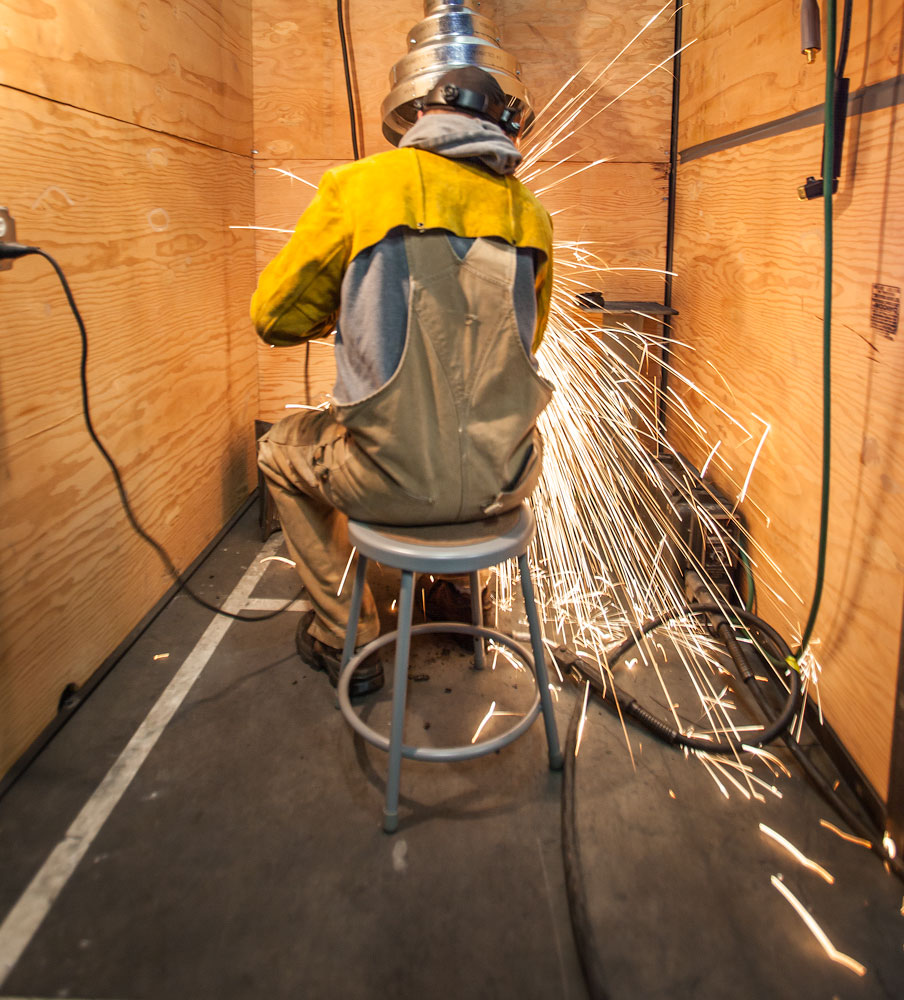 caption: Welding is in demand in industries from construction to aerospace. The pay is good for that reason – and also because it’s dangerous work. 