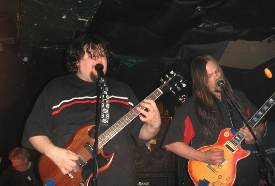 caption: Van Conner (left) performing with Patrick Conner (right). Conner was a founding member of the band Screaming Trees. 