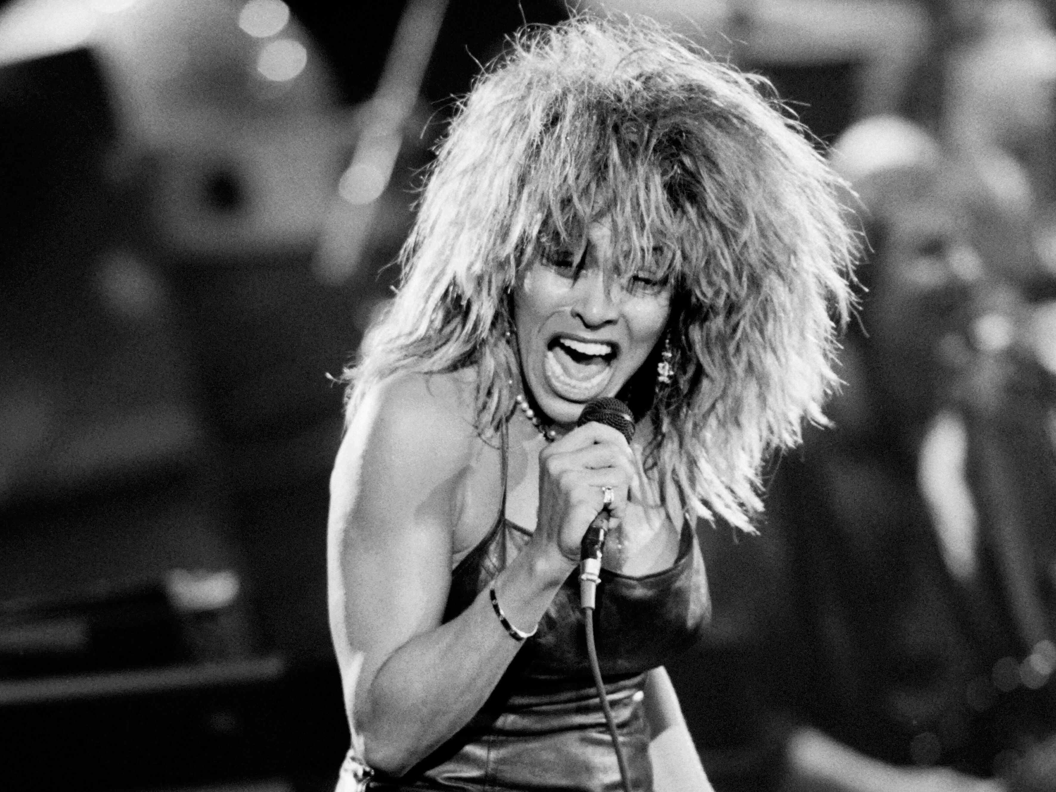 caption: A previously unreleased Tina Turner song, "Hot for You Baby" from the 1980s, has been rediscovered. Turner is pictured above performing in Paris in 1987.