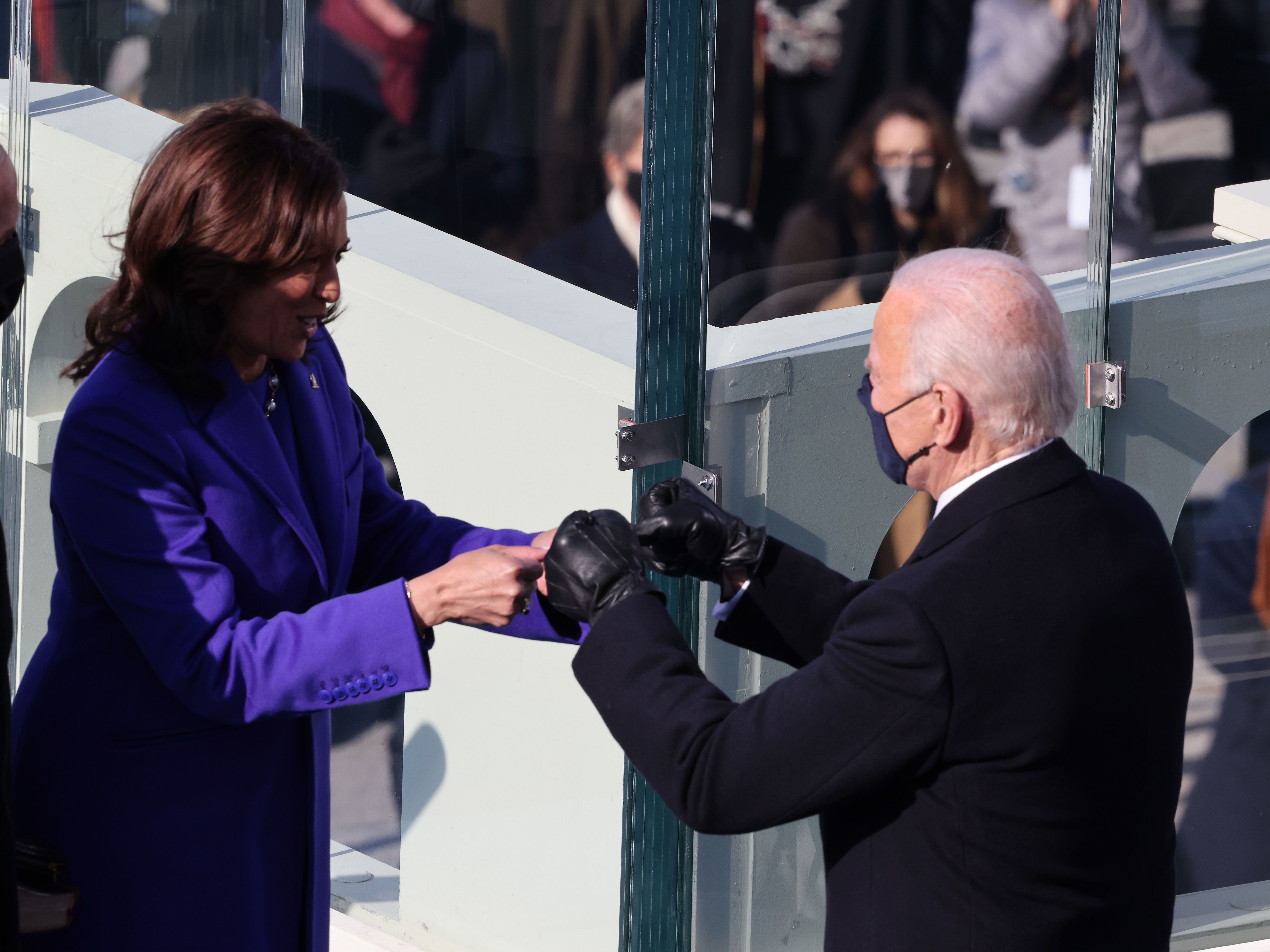 caption: Vice President Harris celebrates with the incoming president after being sworn in Wednesday on the West Front of the U.S. Capitol.