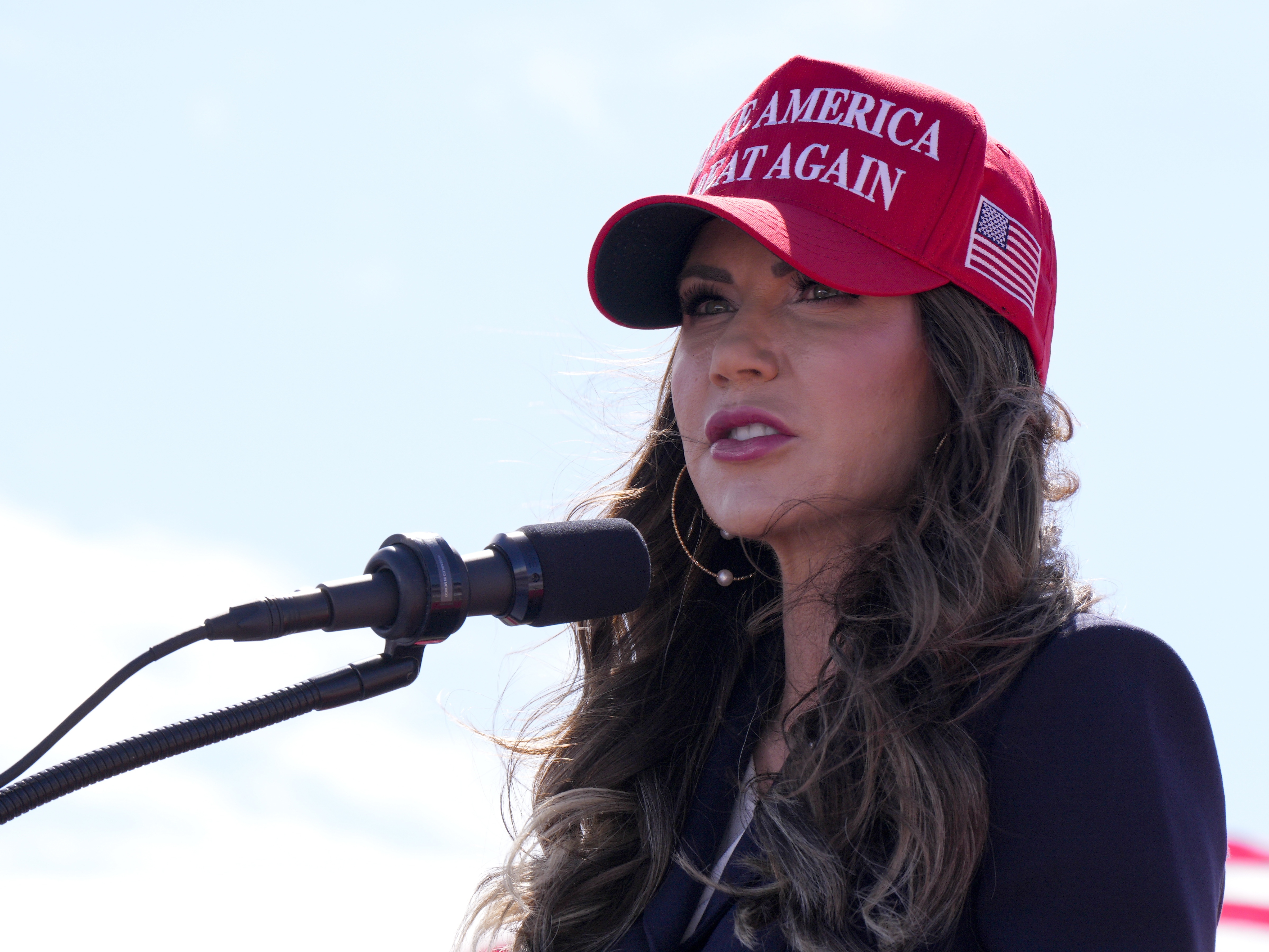 caption: South Dakota Gov. Kristi Noem speaks prior to remarks from then-Republican presidential candidate Donald Trump at a campaign rally March 16 in Vandalia, Ohio.